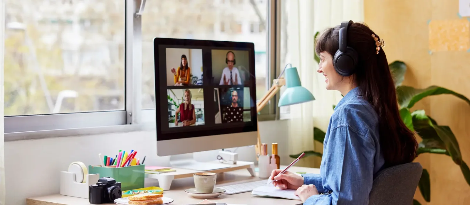 Woman in a video conference in her home office.